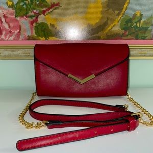Red shoulder bag.